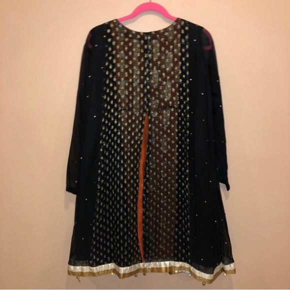 3 pc black gold & orange gharara
shoulder to hem: 37.5”
Pit to pit 22”
Pant 42” - Picture 7 of 7